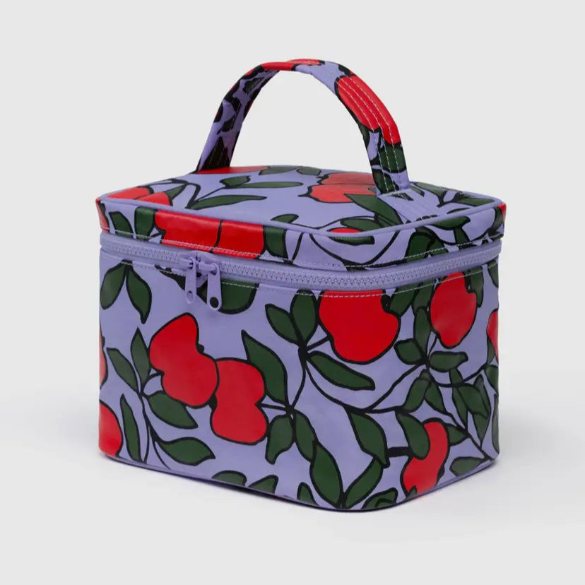 Makeup case with apple pattern on a light gray background