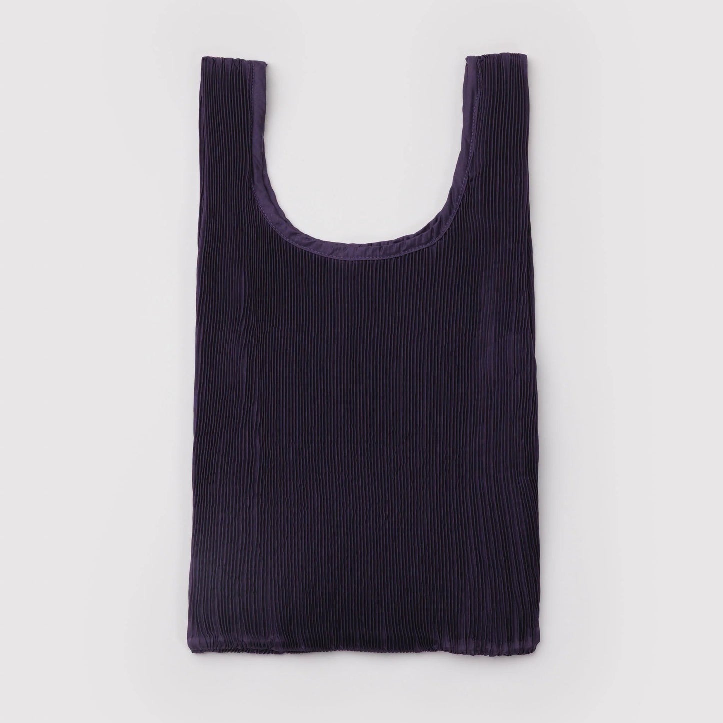 Purple pleated nylon tote on a light gray background