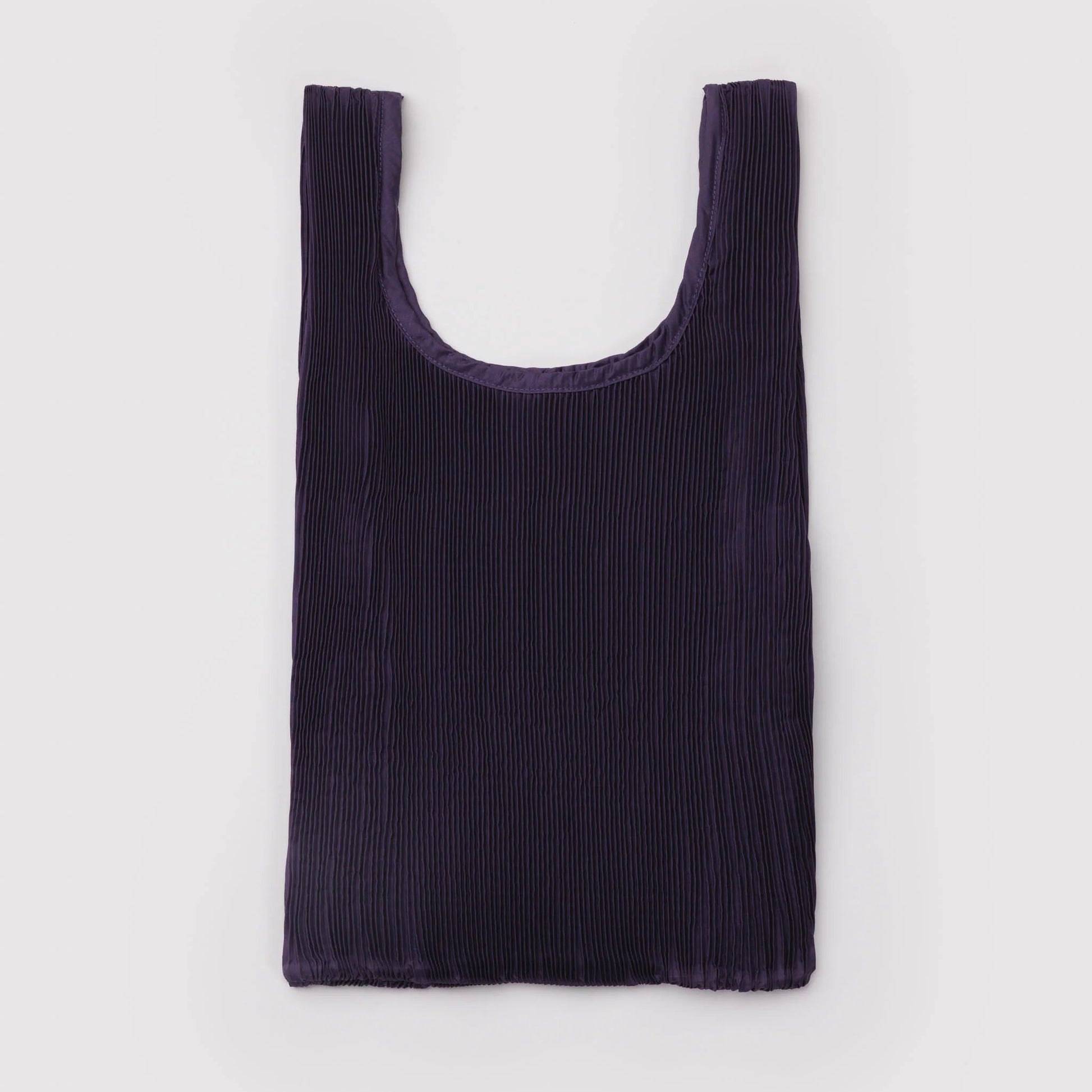 Purple pleated nylon tote on a light gray background